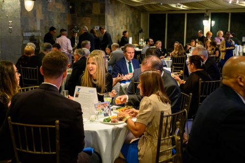 GUESTS ENJOYING SCRUMPTIOUS MEAL